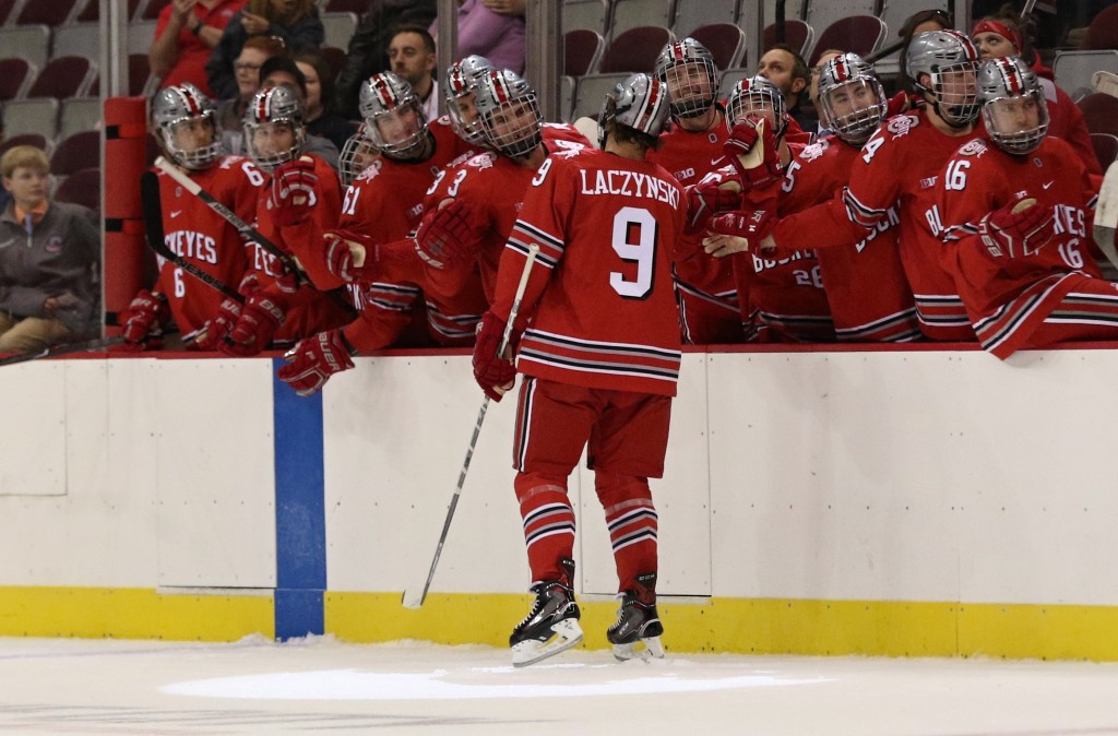 Ohio State sophomore forward Tanner Laczynski, of Shorewood, IL, celebrates scoring the game winning third period goal against Princeton yesterday.  Ohio State won 4-2, and advanced to play in the Midwest Region final today for a shot at a spot in the Frozen Four.  That game started about 25 minutes ago, as of the time of this posting, and is on ESPNU.