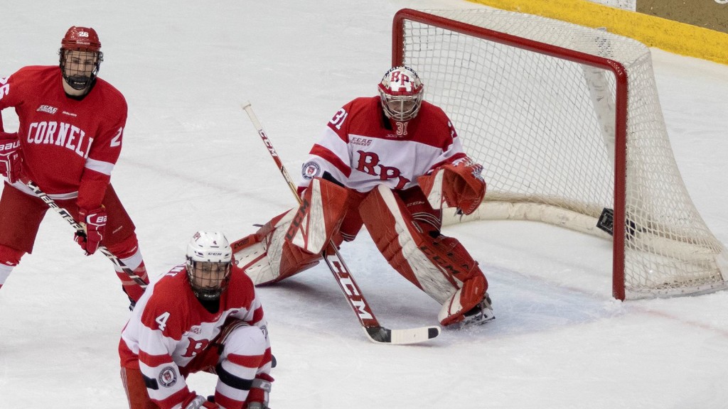 Cornell junior forward Tristan Mullin, of Cartwright, MAN., moves into position at the left side of the RPI net just a moment before  he finished off the play with a one-timer on a first period power play to give Cornell the 1-0 lead over RPI.  Mullin scored a goal and added an assist in Friday's 3-0 win at RPI, and he scored a goal and added an assist in Saturday's 3-3 tie at Union College.  The 6'2" forward is fourth on his team in goals scored, with five, and it tied for tenth in assists, with five.  Cornell, 12-1-2, ranked #1, hosts #17 Northern Michigan for two games this weekend.