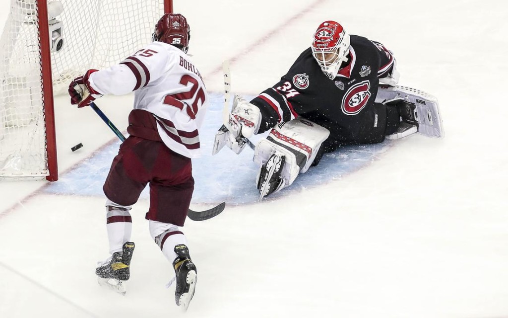 Massachusetts freshman defenseman Aaron Bohlinger, of Walden, N.Y., scored this fast-break, two-on-none, game winning goal, helping his team to its 5-0 shutout win over St. Cloud State University for the NCAA Championship,  on Saturday in Pittsburgh, PA.