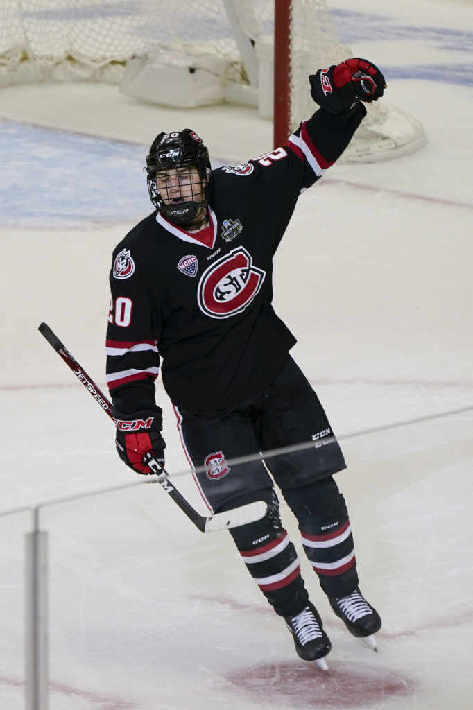 St. Cloud State junior forward Nolan Walker, of Anchorage, AK., exults after scoring the game-winning goal yesterday in his team's 5-4 win over Mankato State.  St. Cloud State, ranked #7, and now 20-10-0, will face #6 Massachusetts in the Frozen Four Championship game in Pittsburgh, PA., tomorrow, April 10th, at 4:00pm Pacific Time on ESPN.