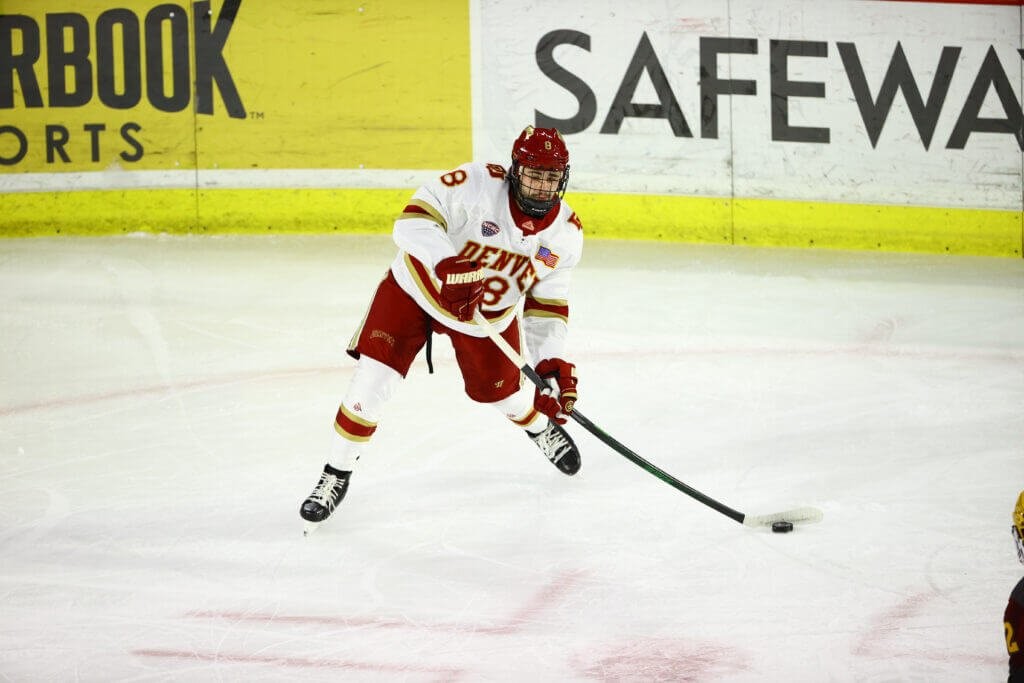 Denver sophomore forward Carter Savoie, of St. Albert, ALB., tallied an assist in his team's 5-0 win Friday night, then scored two goals and added another assist in his team's 5-2 Saturday night as his team swept their home-and-home weekend against Colorado College.  The 5'10" 193lb forward is tied for first on his team in goals scored, with twenty, and is sixth on the team in assists, with twenty.  Denver, 25-8-1, and ranked #3, hosts Miami of Ohio this weekend for a best-two-of three in opening round action of the NCHC Tournament.