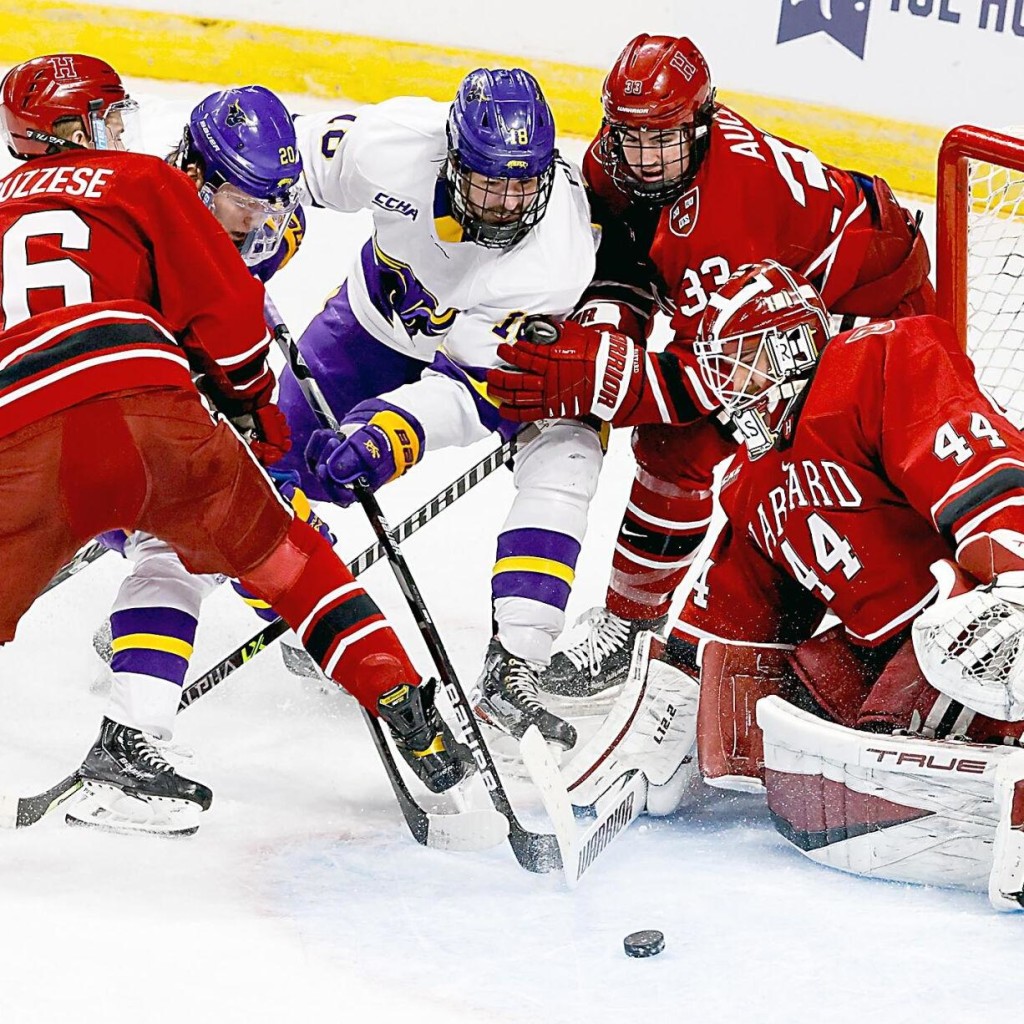 Mankato State sophomore forward Ondrej Pavel, of Prague, Czech Republic (in center, in white), managed to score this late game-winning goal, helping his team to a 4-2 win over Harvard in opening round play of the Eastern Region in Albany, N.Y., on Thursday.  Pavel is seventh in goals scored on his team, with eleven, and is fourteenth in assists, with nine.  Mankato State advanced to play Notre Dame on Saturday.
