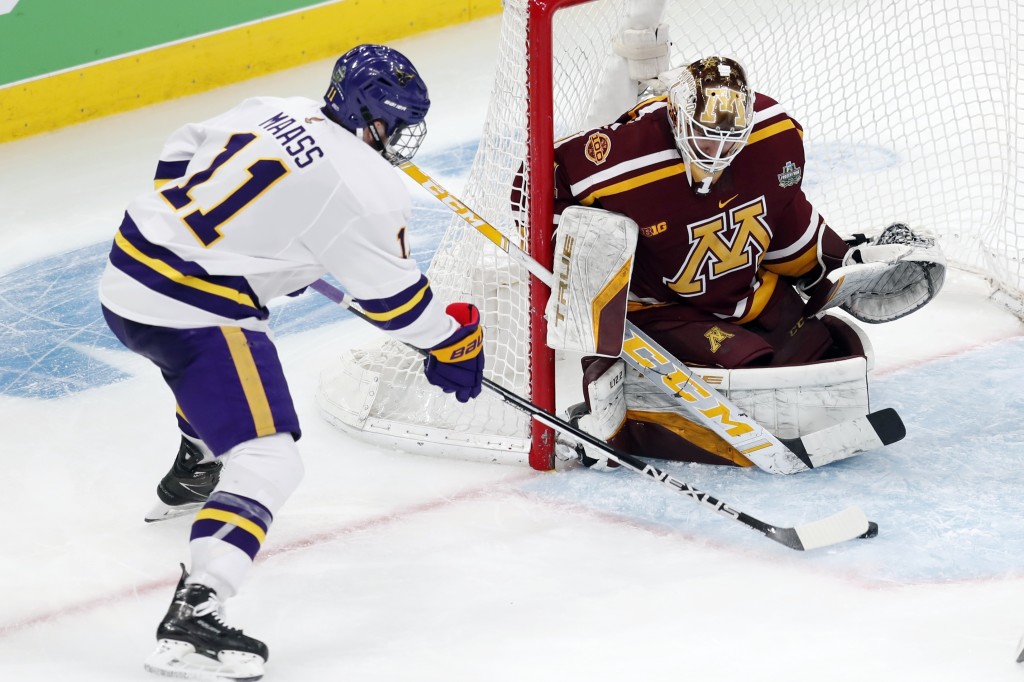 Mankato State sophomore defenseman Benton Maass, of Elk River, MN., scored this second period goal to tie the game up, en route to his team's 5-1 demolition of Minnesota yesterday in a Frozen Four semifinal in Boston.  Mankato State advanced to play Denver today in the NCAA Frozen Four Championship Game in Boston today at 5:00PM Pacific Time on ESPN2.